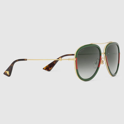 Picture of 古驰中性金属条纹织带太阳眼镜